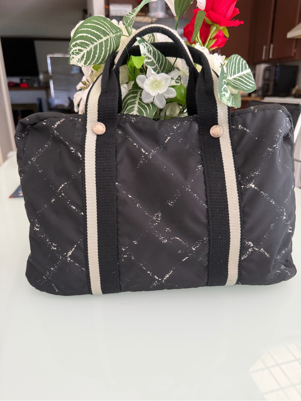 CHANEL Black Quilted Tote with Cream-Trim Straps
